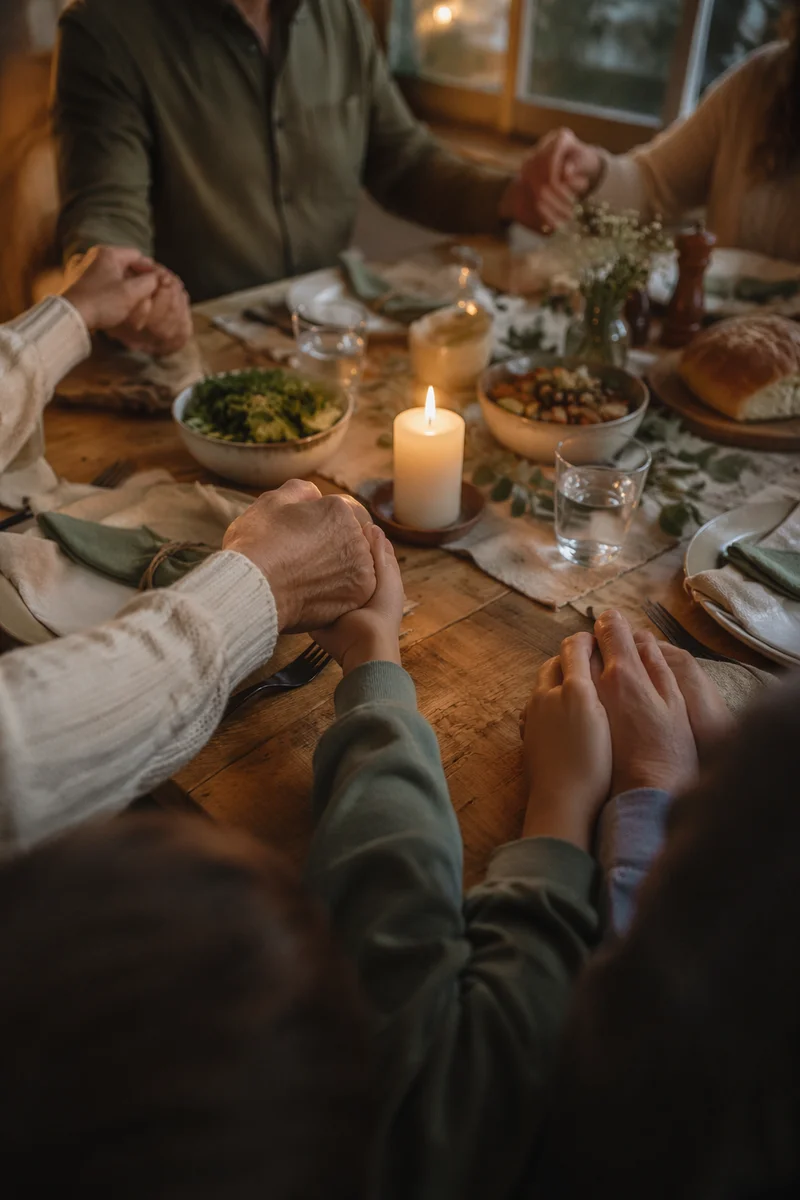Christian Family Dinner Prayer Around Rustic Table