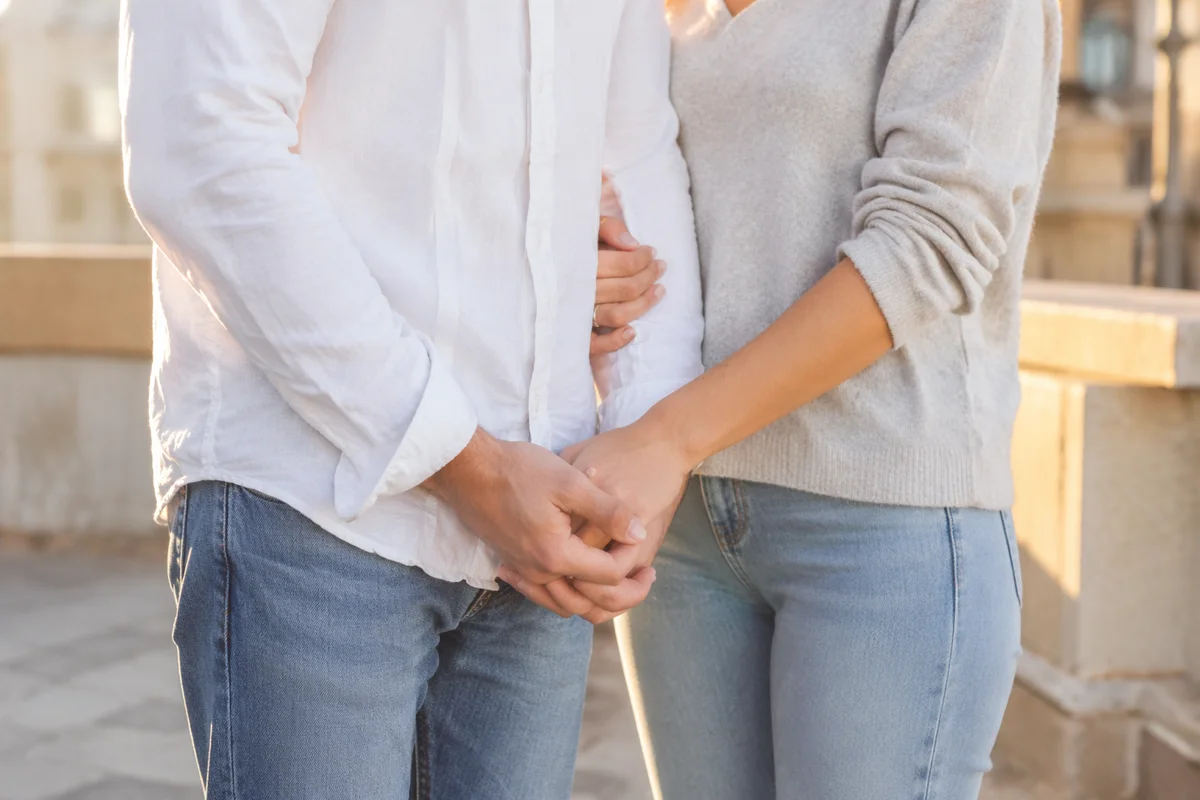 Couple Praying Together in Gentle Evening Light
