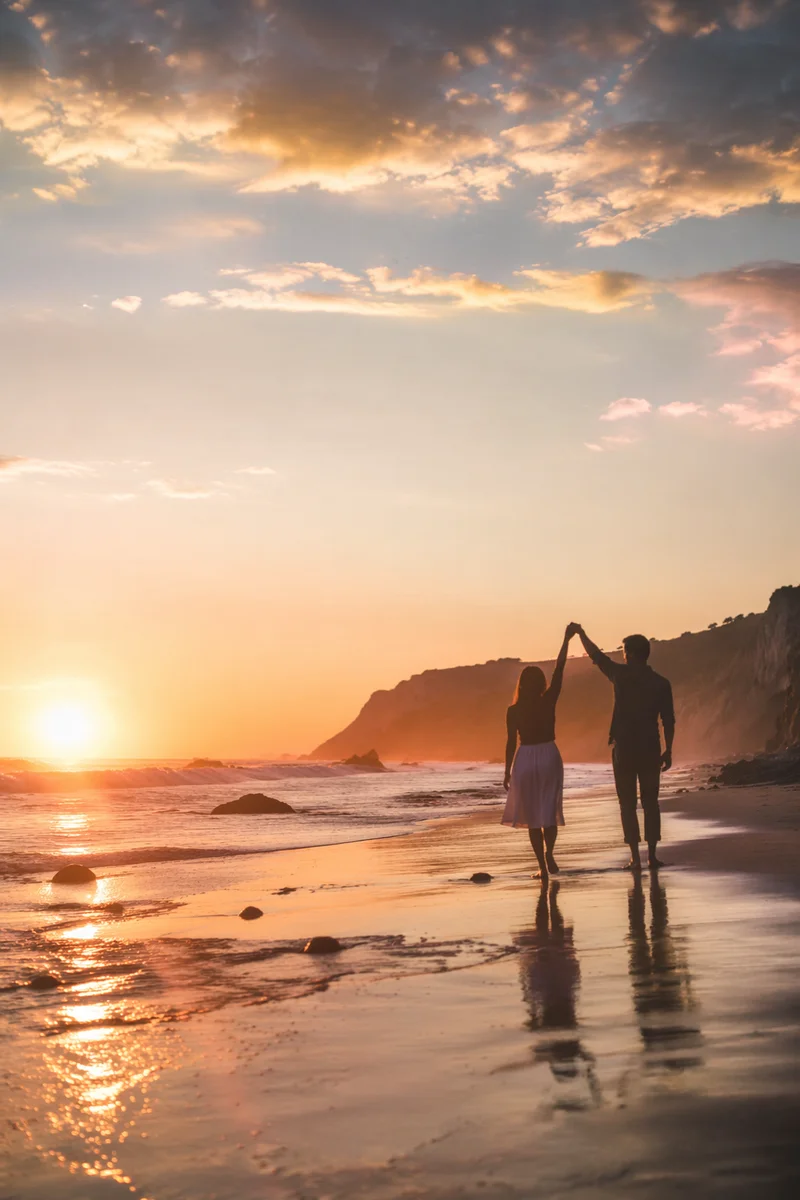 Romantic Couple Walking on Sunset Beach