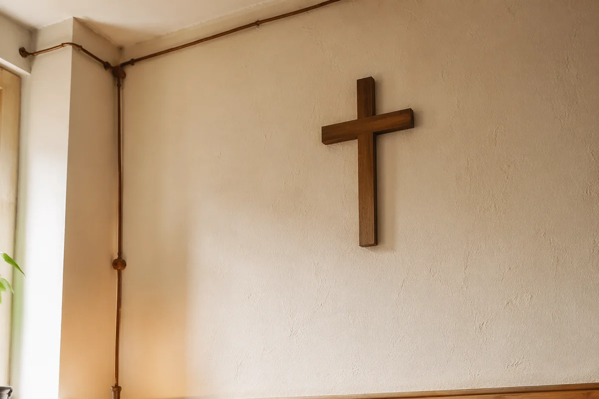 Wooden Cross in Cozy Living Room Corner