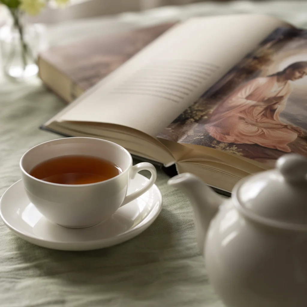 Tea Cup and Open Book Still Life