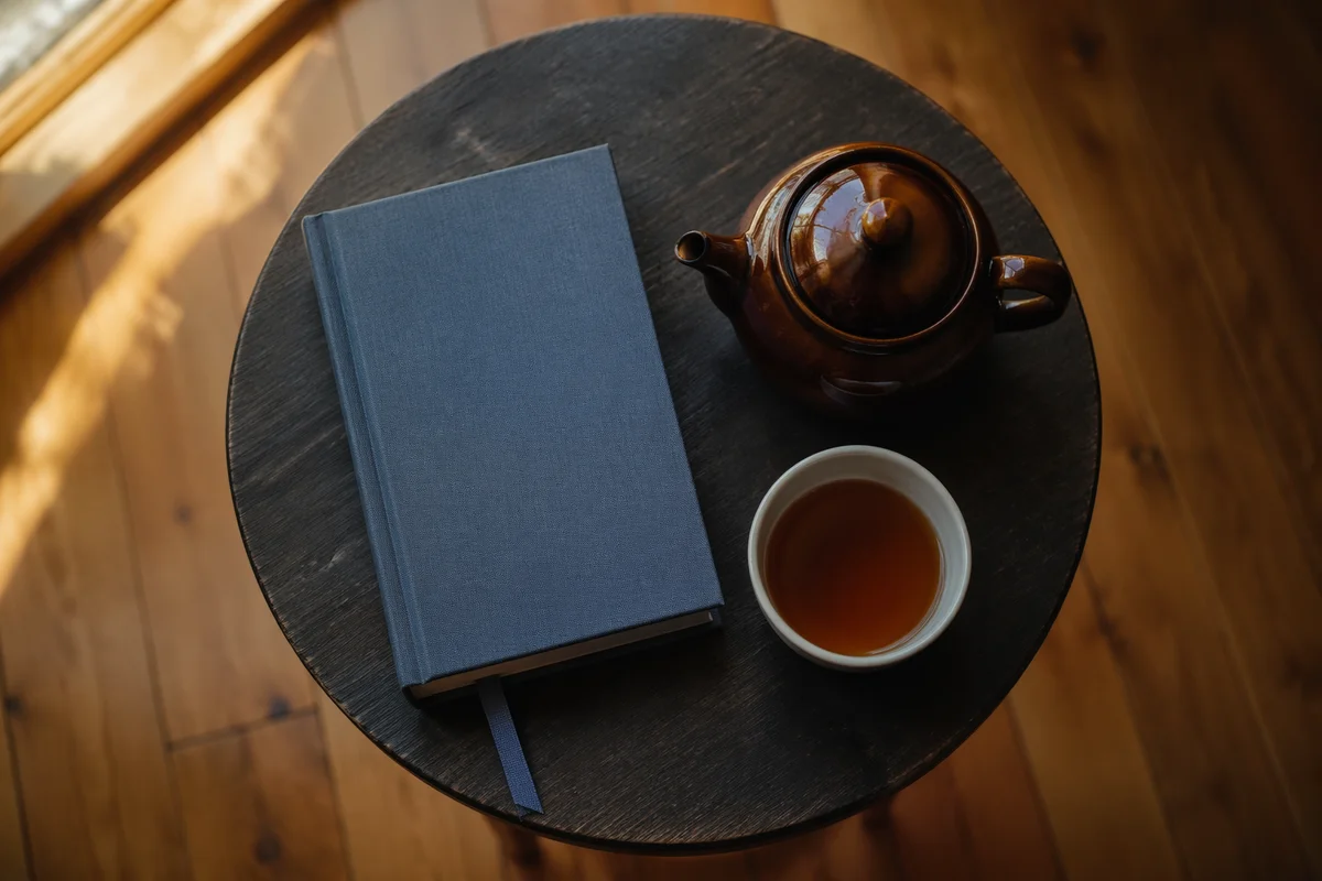 Devotional Book and Tea on Table
