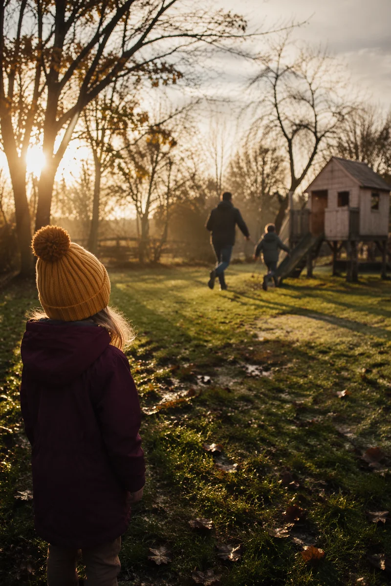 Father Playing with Children at Sunset