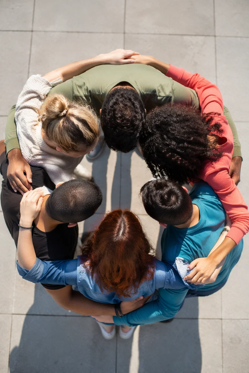 Overhead Circle Hug of Diverse Friends