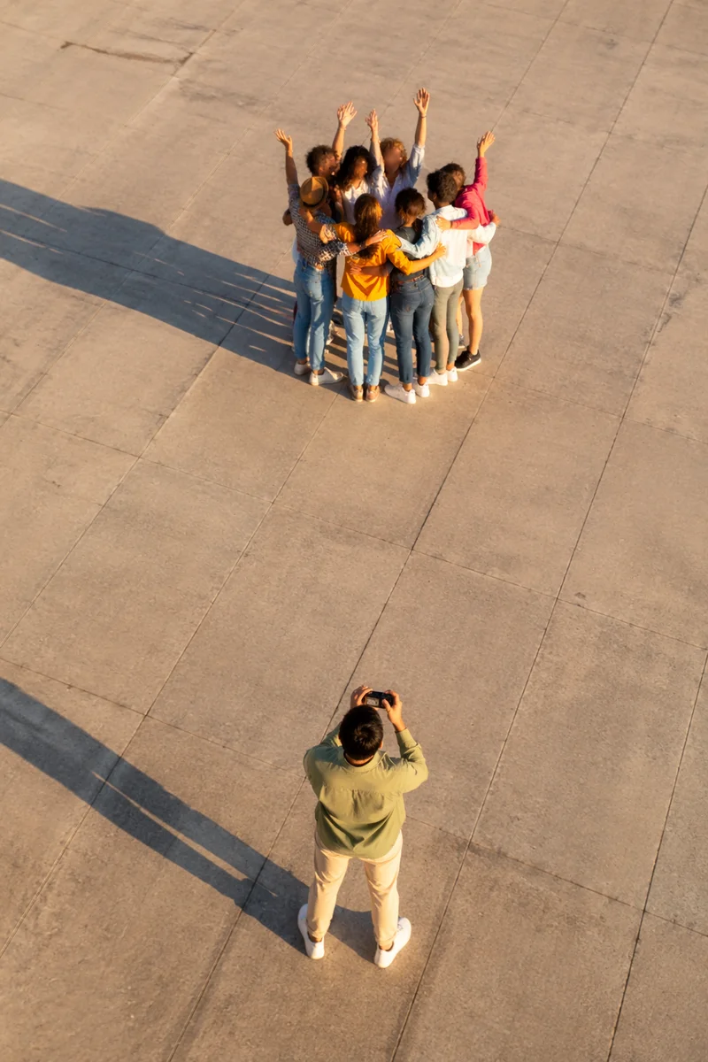 Joyful Friends Group Hug From Above