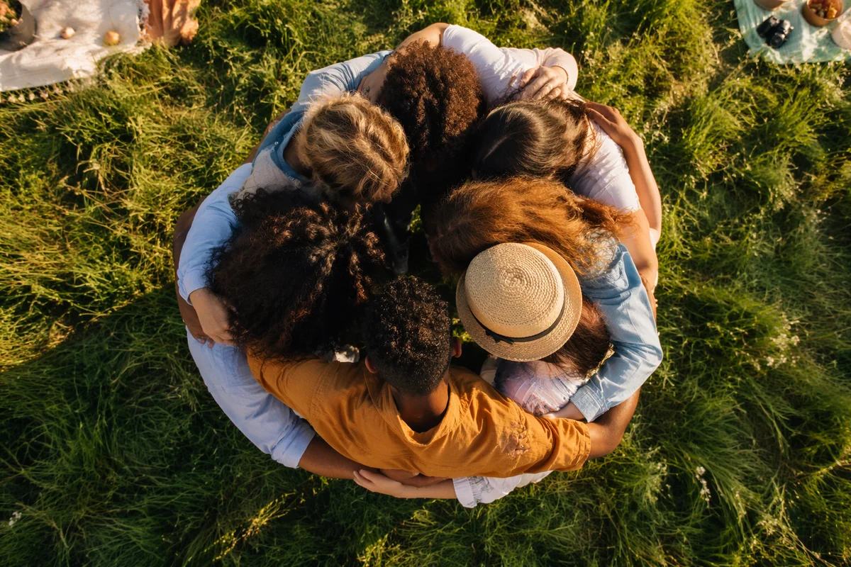 Diverse Friends Group Hug Circle Above