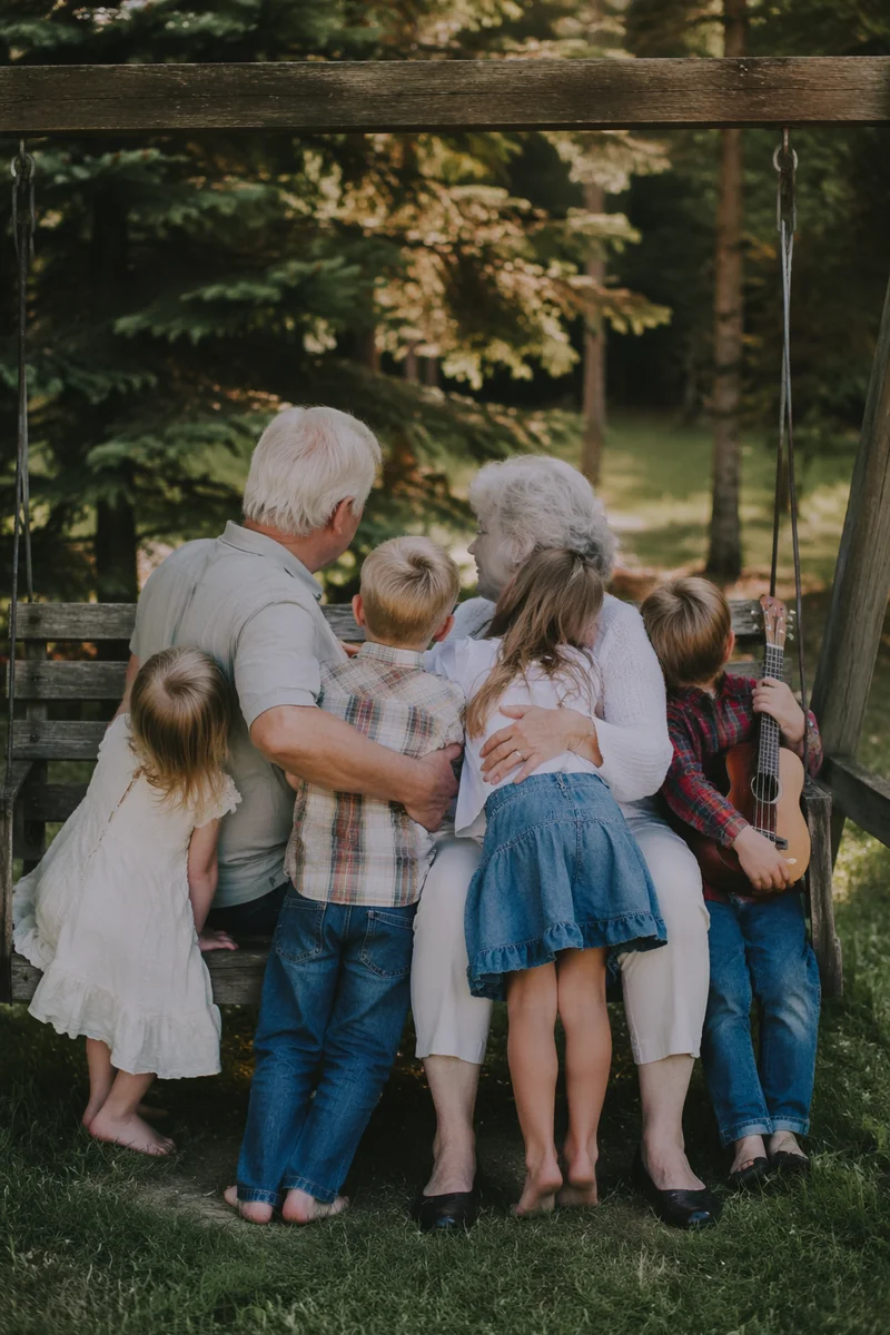 Grandparents and Grandchildren on Park Bench