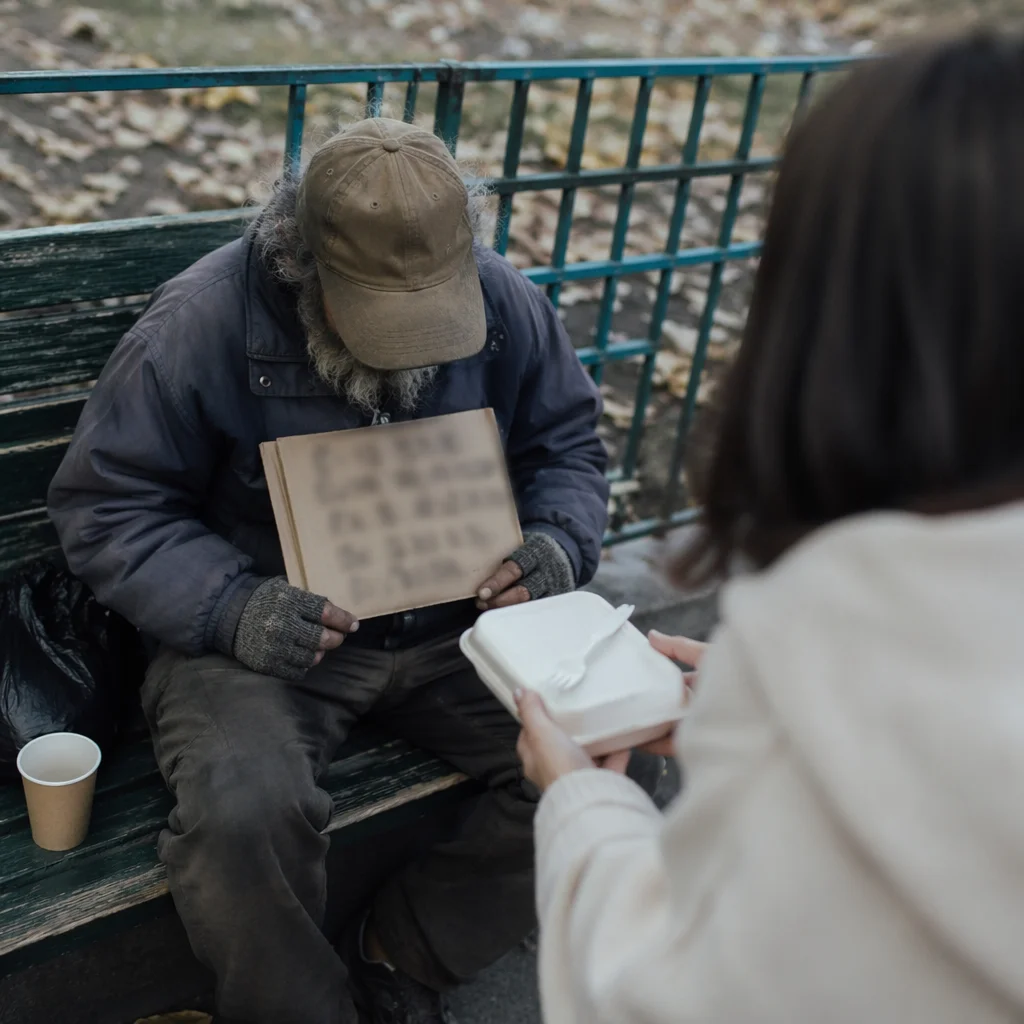 Compassionate Meal Sharing in Urban Park