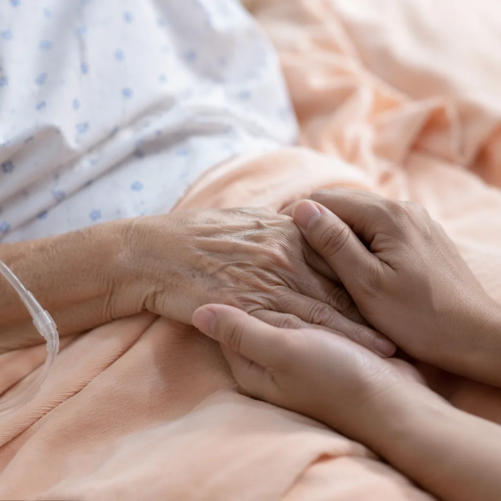 Hospital Bedside Prayer and Comforting Hands