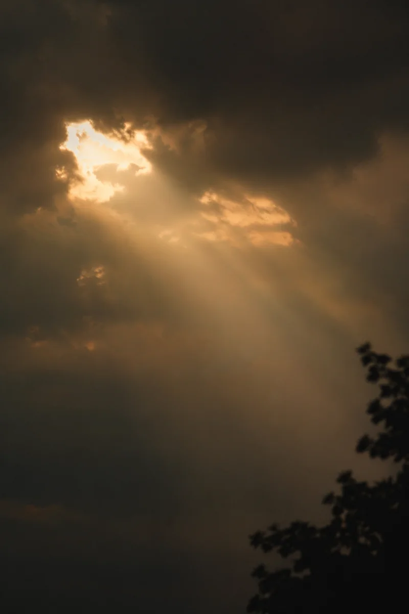 Sunlight Breaking Through Storm Clouds