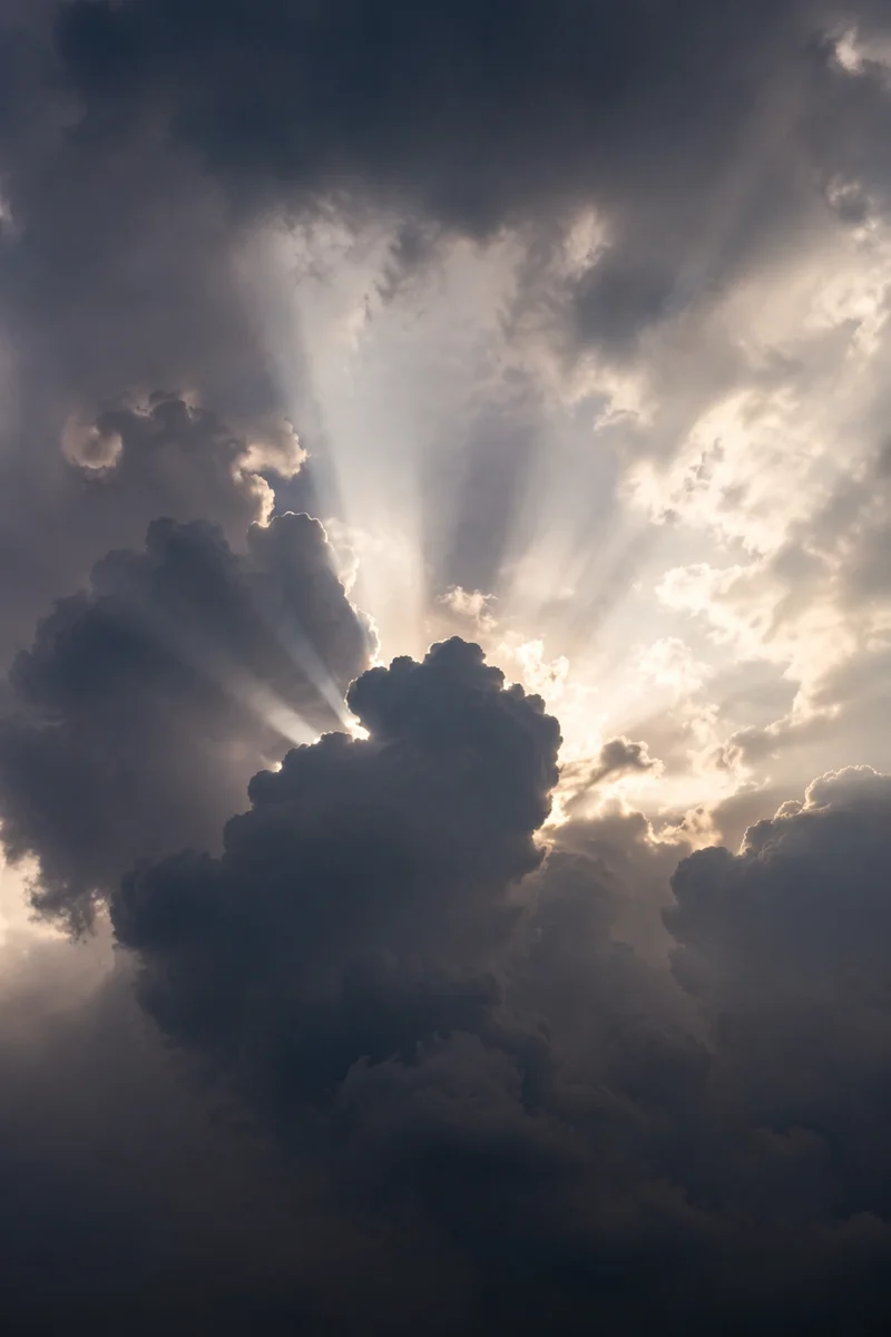 Hopeful Light Breaking Through Storm Clouds
