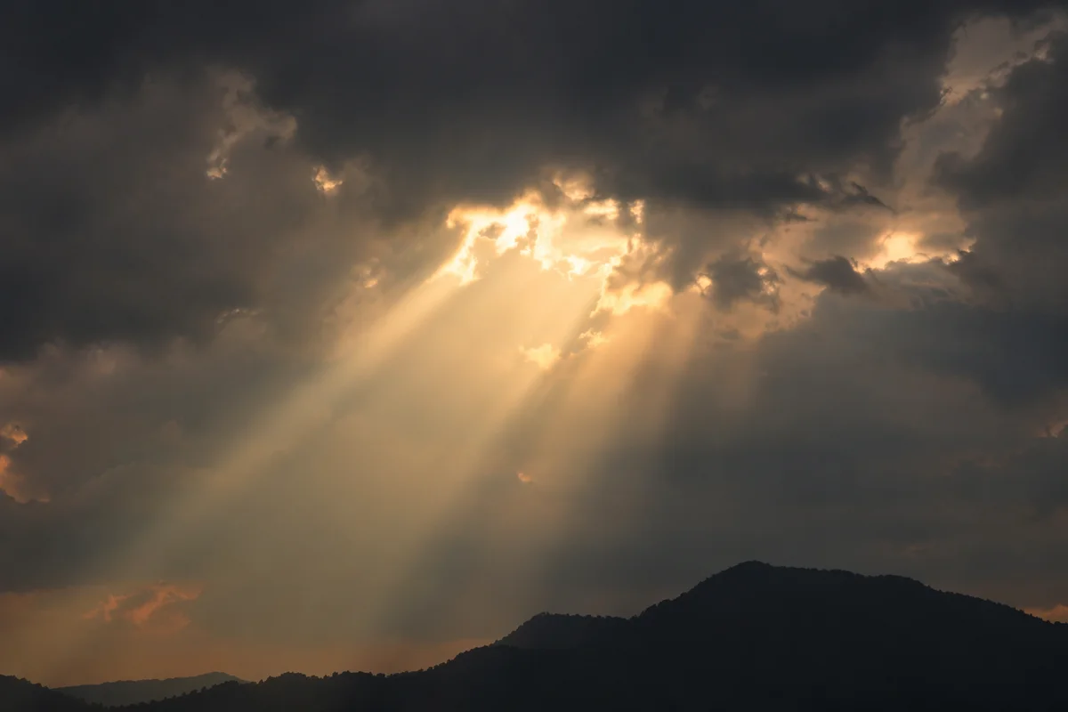 Golden Hope Breaking Through Storm Clouds