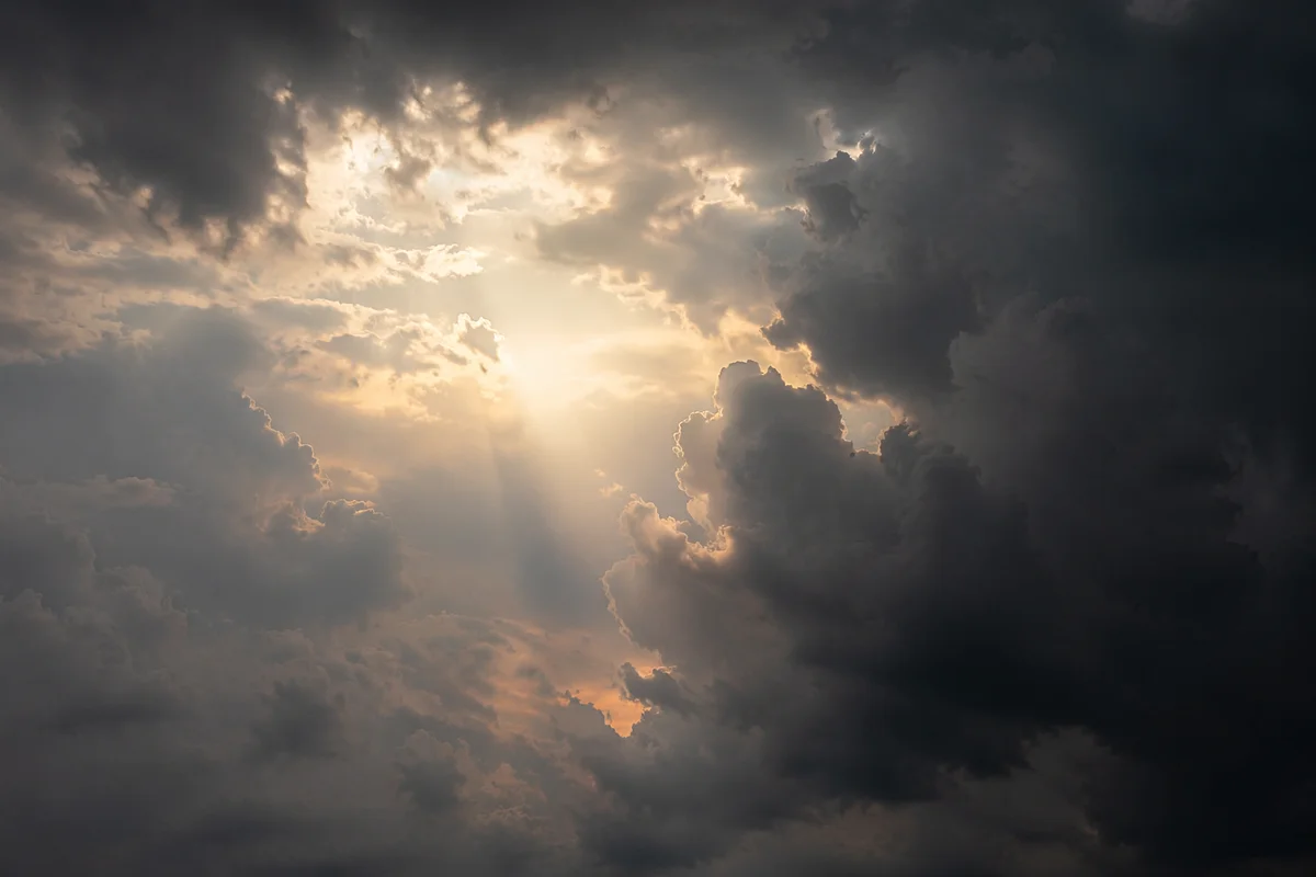 Sunlight Breaking Through Storm Clouds