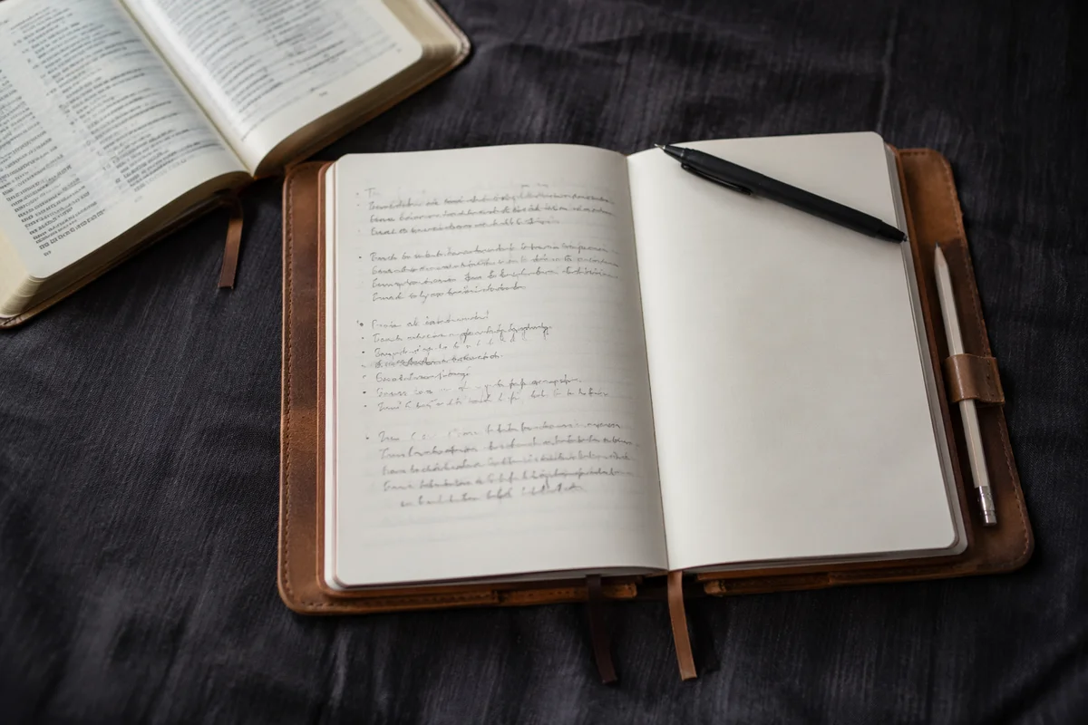 Open Journal with Handwritten Scripture Notes