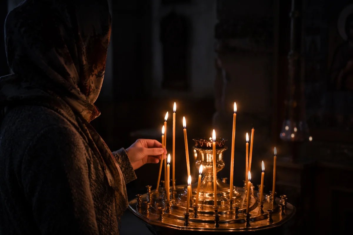 Candlelit Prayer in a Dark Church