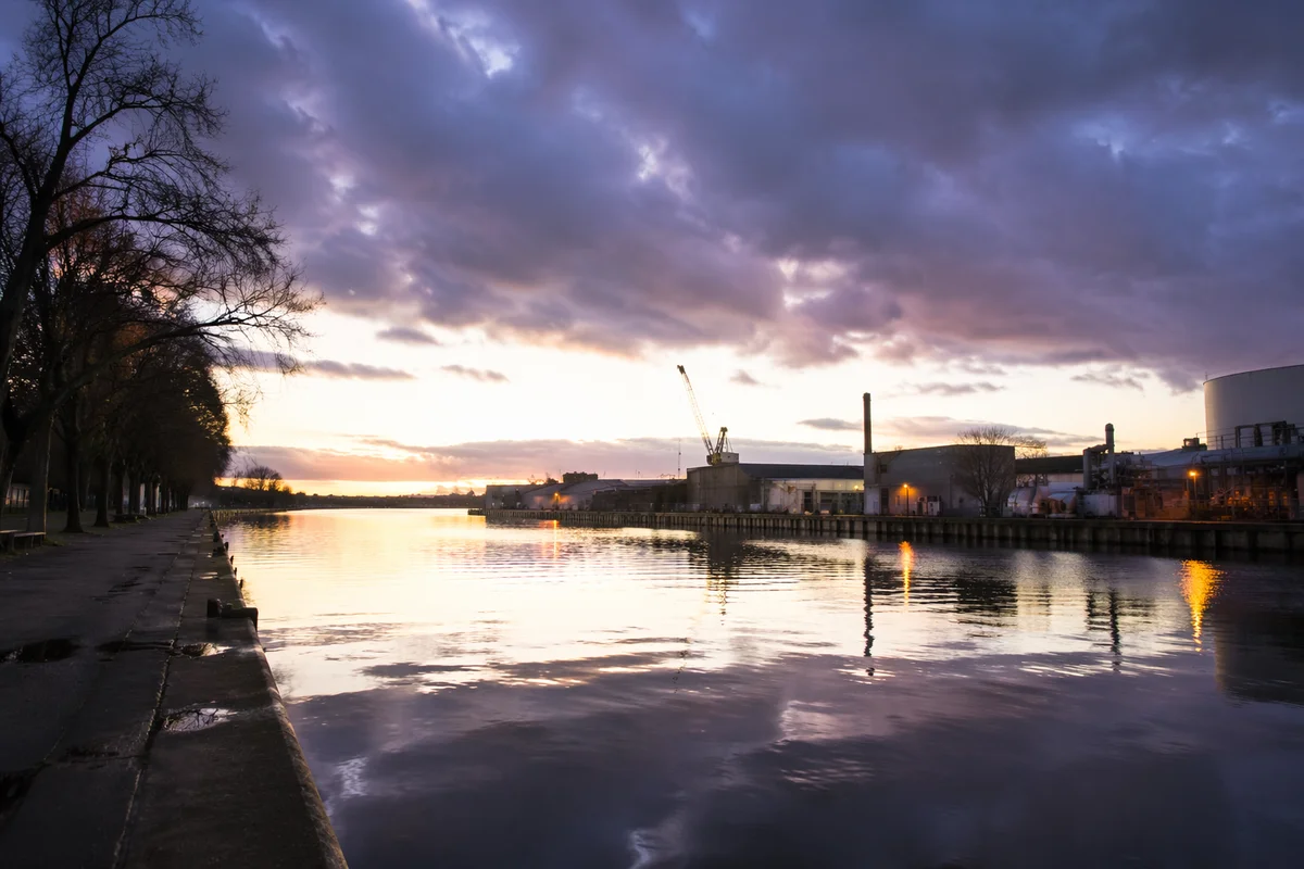 Peaceful Canal Sunrise After the Storm