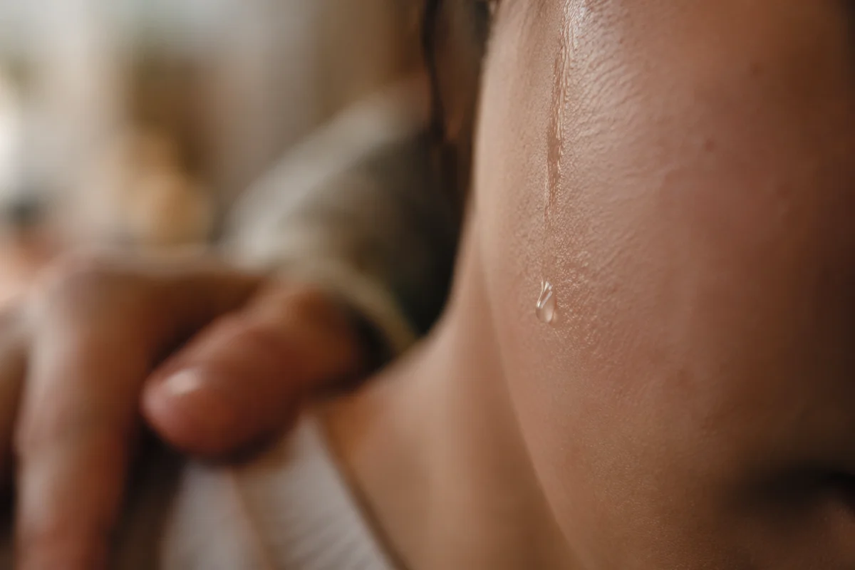 Single Tear and Gentle Comforting Touch
