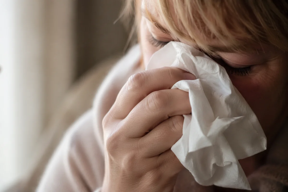 Woman Wiping Tears in Quiet Comfort