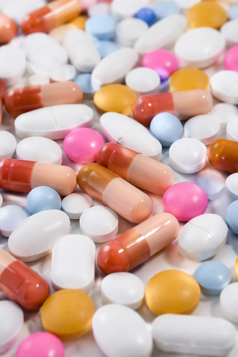 Assorted Medicine Pills on Pharmacy Counter