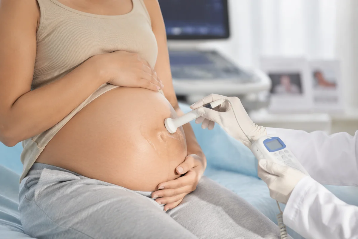 Prenatal Doppler Exam on Maternity Belly