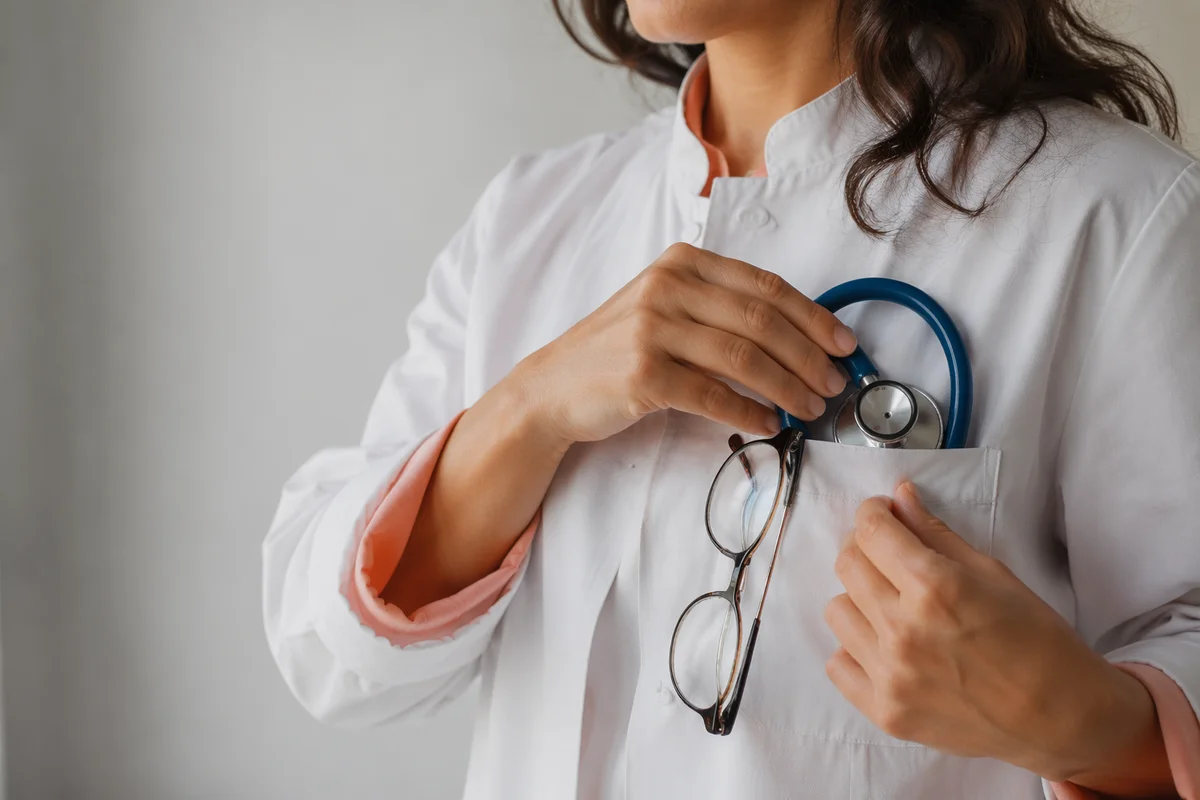 Blue Stethoscope in White Coat Pocket