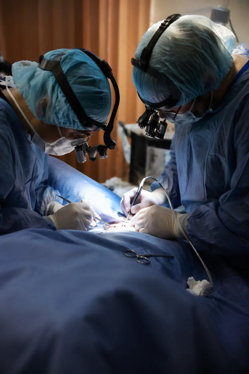 Medical Team Performing Sterile Surgery