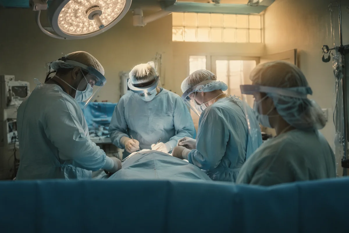 Hopeful Surgical Team in Modern Operating Room