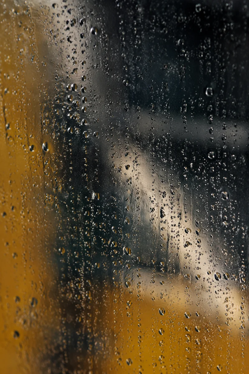 Rain Drops on Stormy Window Glass