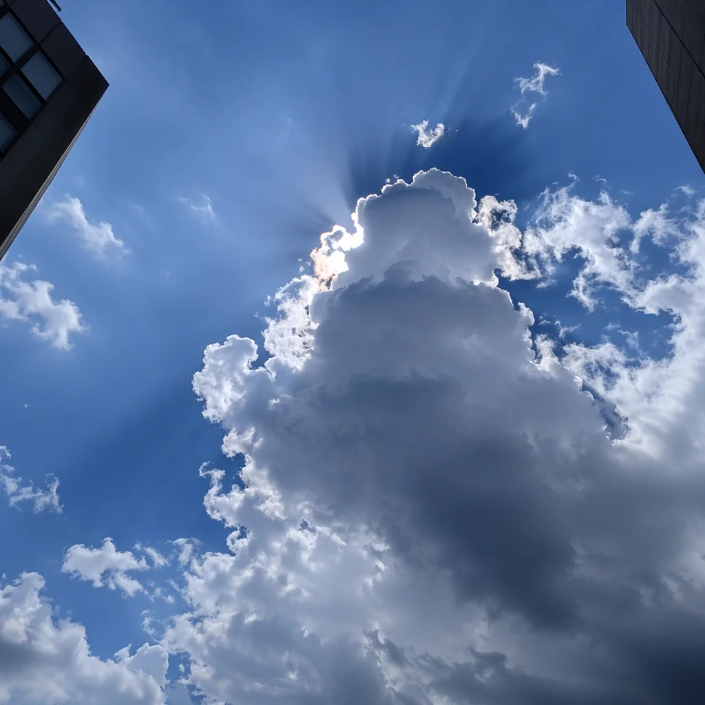 Sun Rays Breaking Through Cumulus Clouds