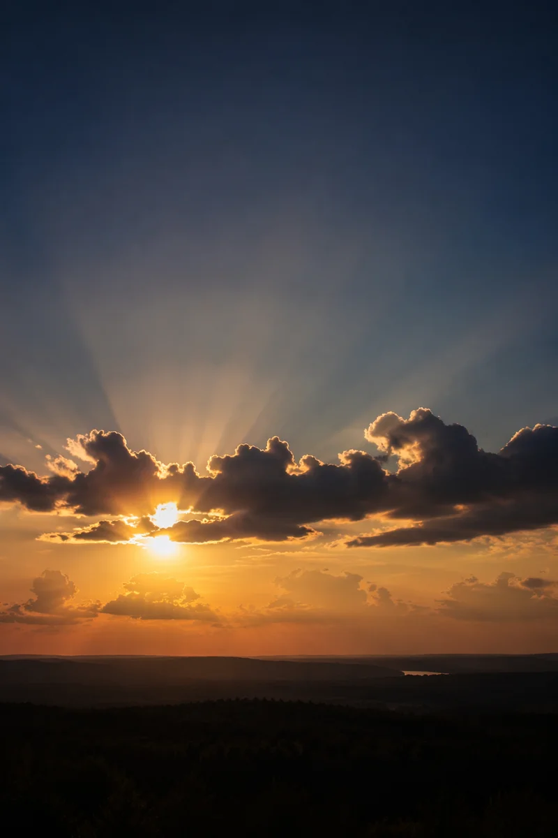 Sun Rays Breaking Through Dramatic Clouds