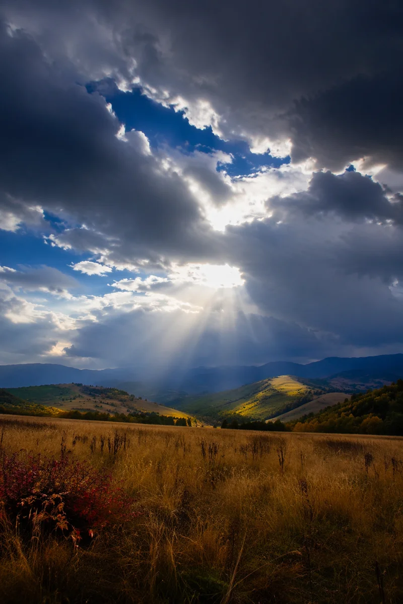 Sun Rays Breaking Through Storm Clouds