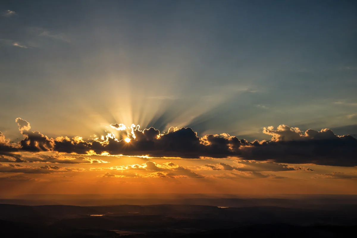 Sun Rays Breaking Through Dramatic Clouds
