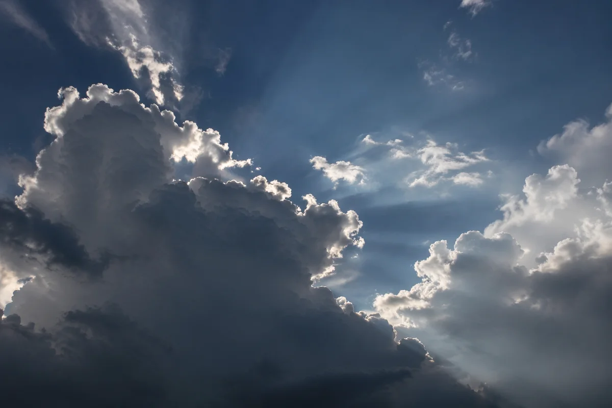 Sun Rays Breaking Through Storm Clouds