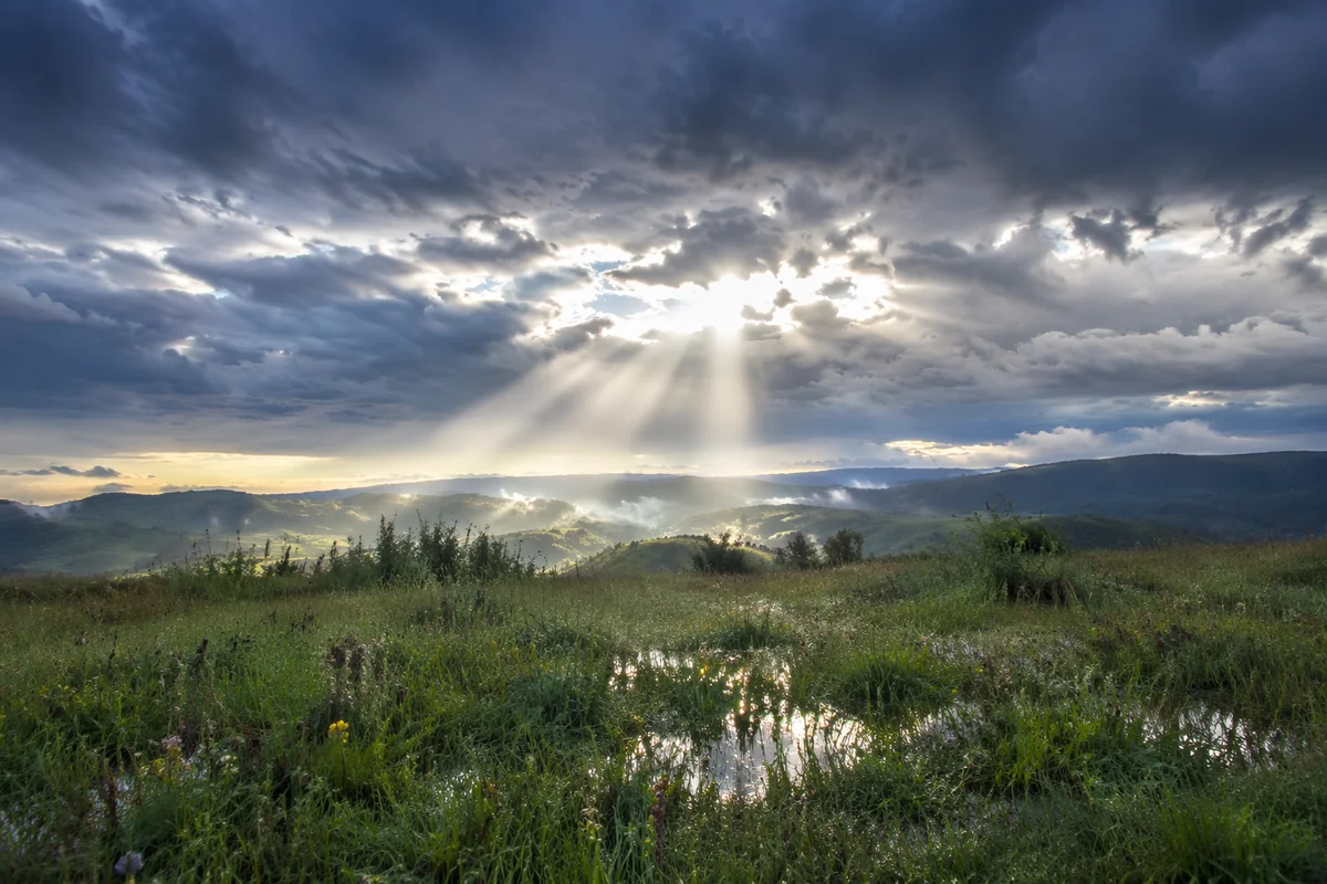 Sun Rays Breaking Through Storm Clouds
