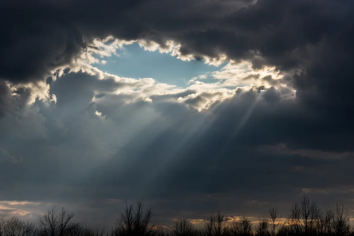 Sun Rays Breaking Through Storm Clouds