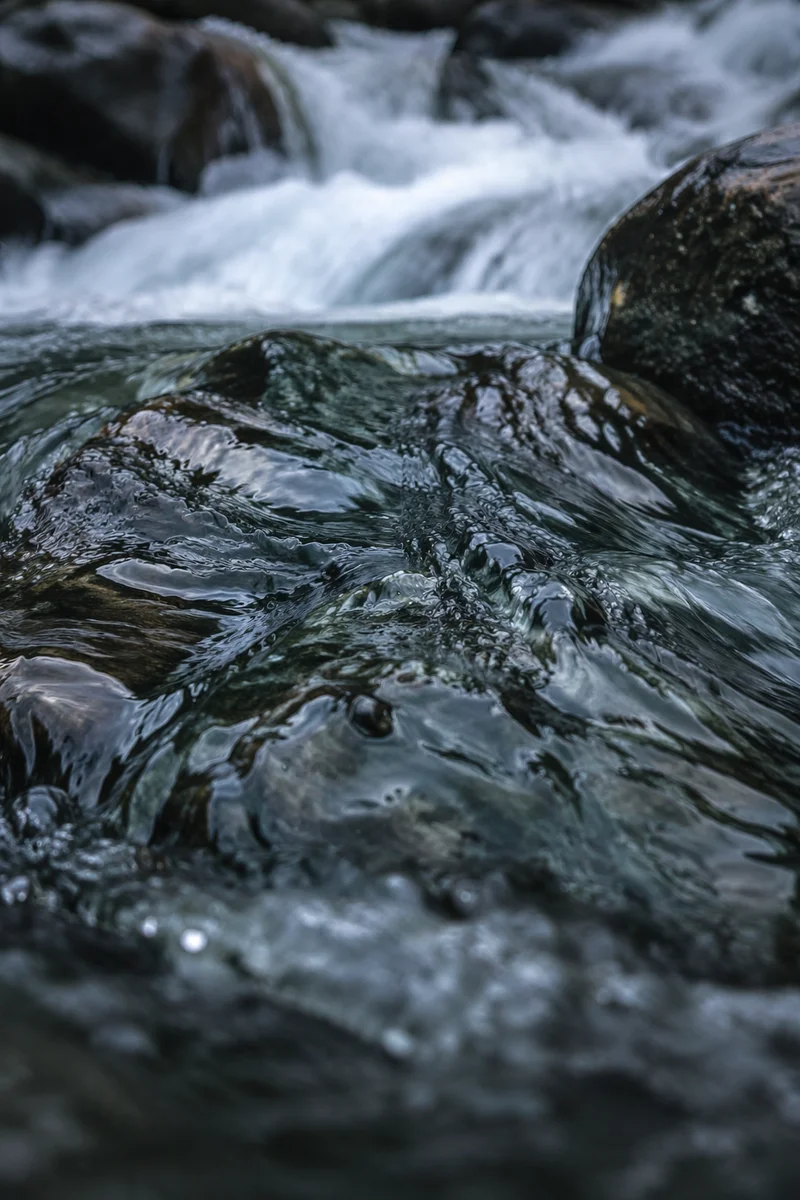 Clear Mountain Stream Over Dark Stones