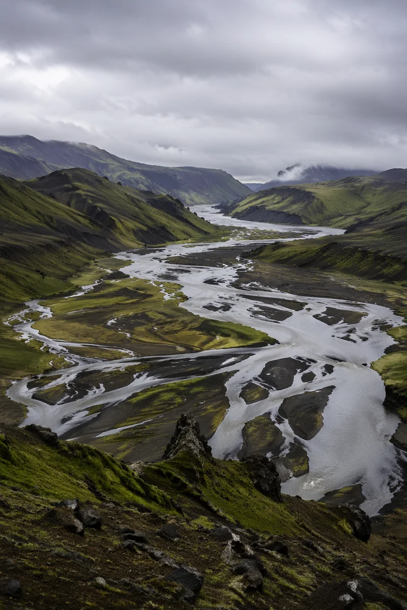 Aerial Winding River in Misty Green Valley