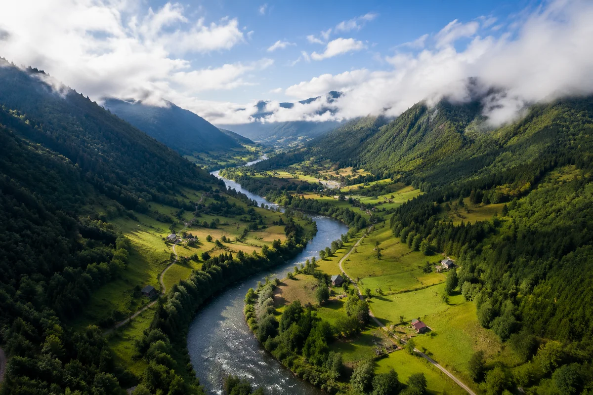 Winding River Through Lush Mountain Valley