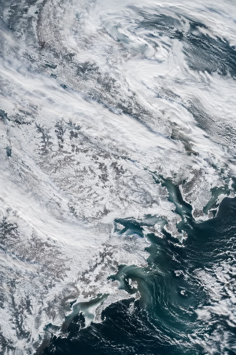 Blizzard Over Frozen Coastal Winter Roads