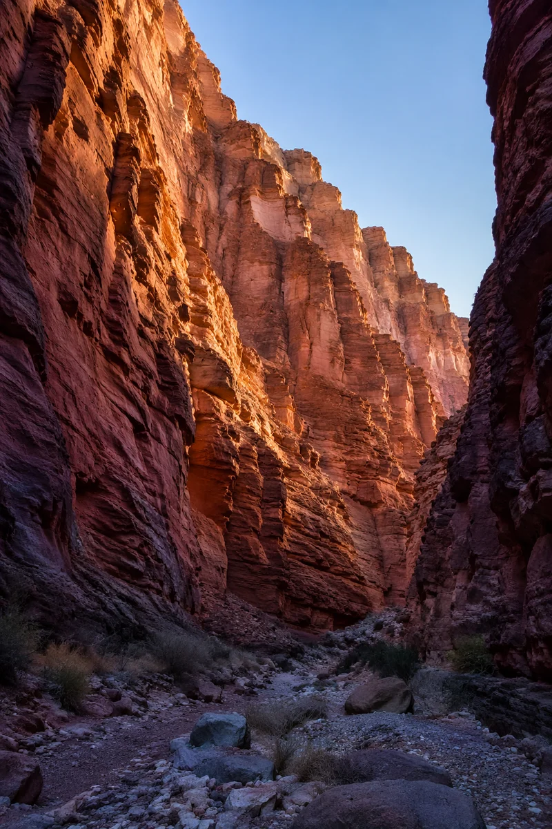 Towering Red Canyon Walls at Sunrise