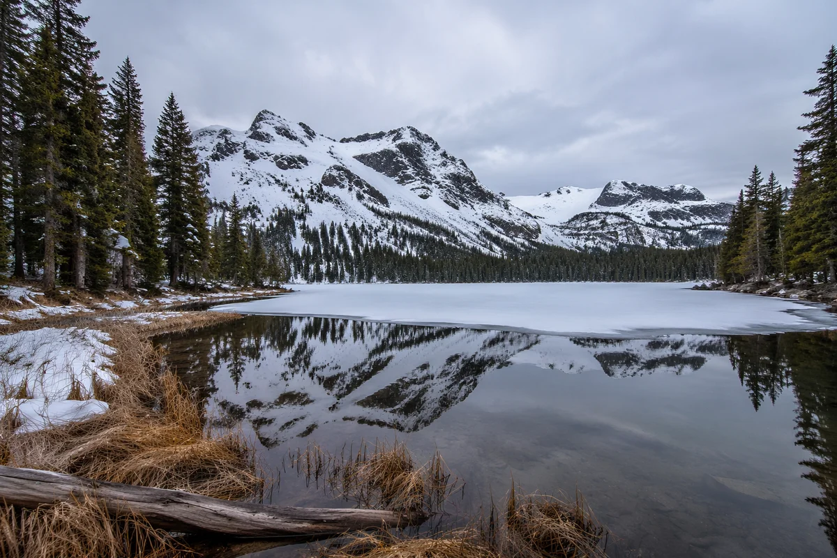 Frozen Alpine Lake Mountain Reflection