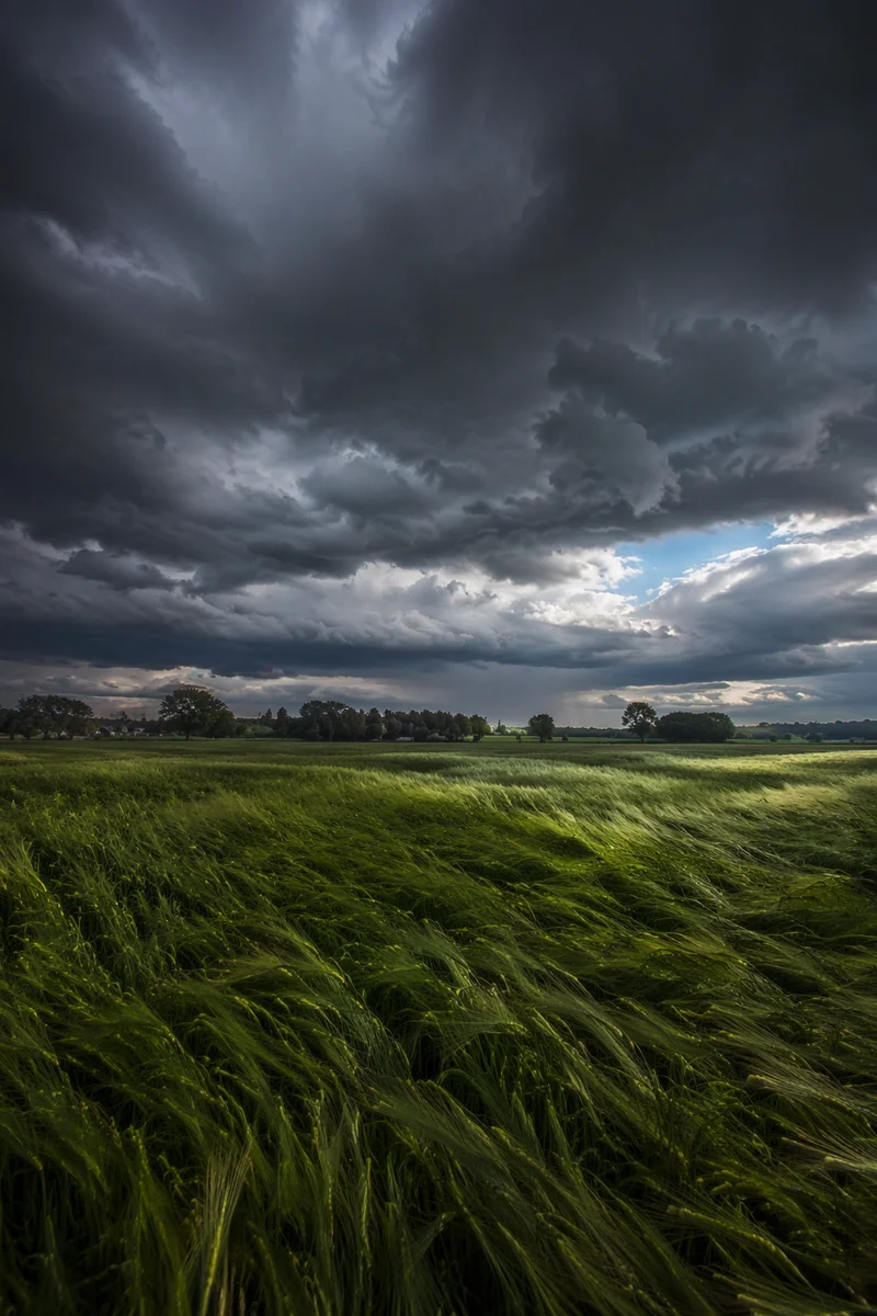 Rural Farmland Beneath Approaching Hailstorm Clouds