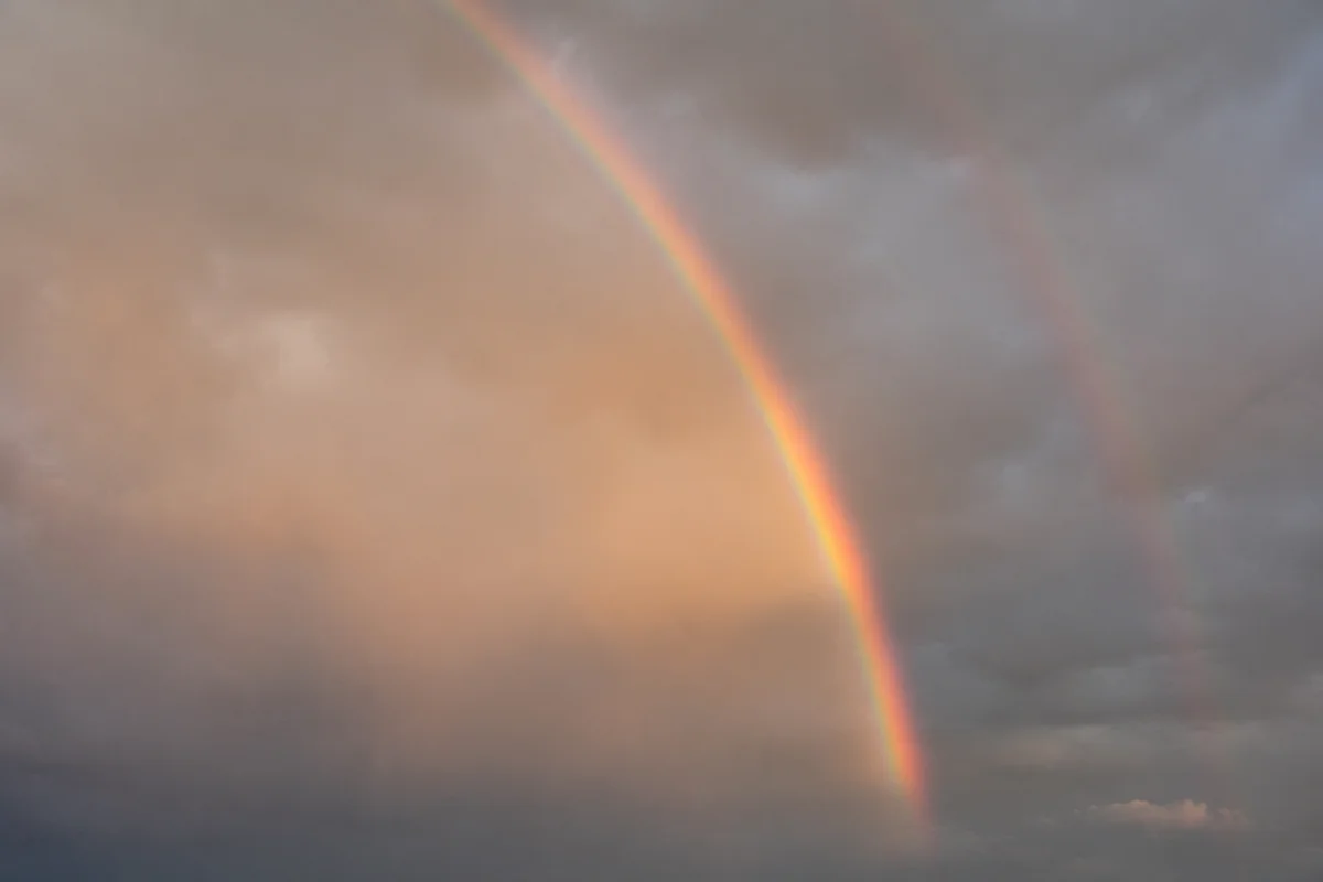 Rainbow After Rain in Beautiful Sky