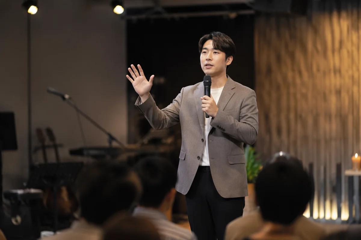 Young Pastor Speaking on Church Stage