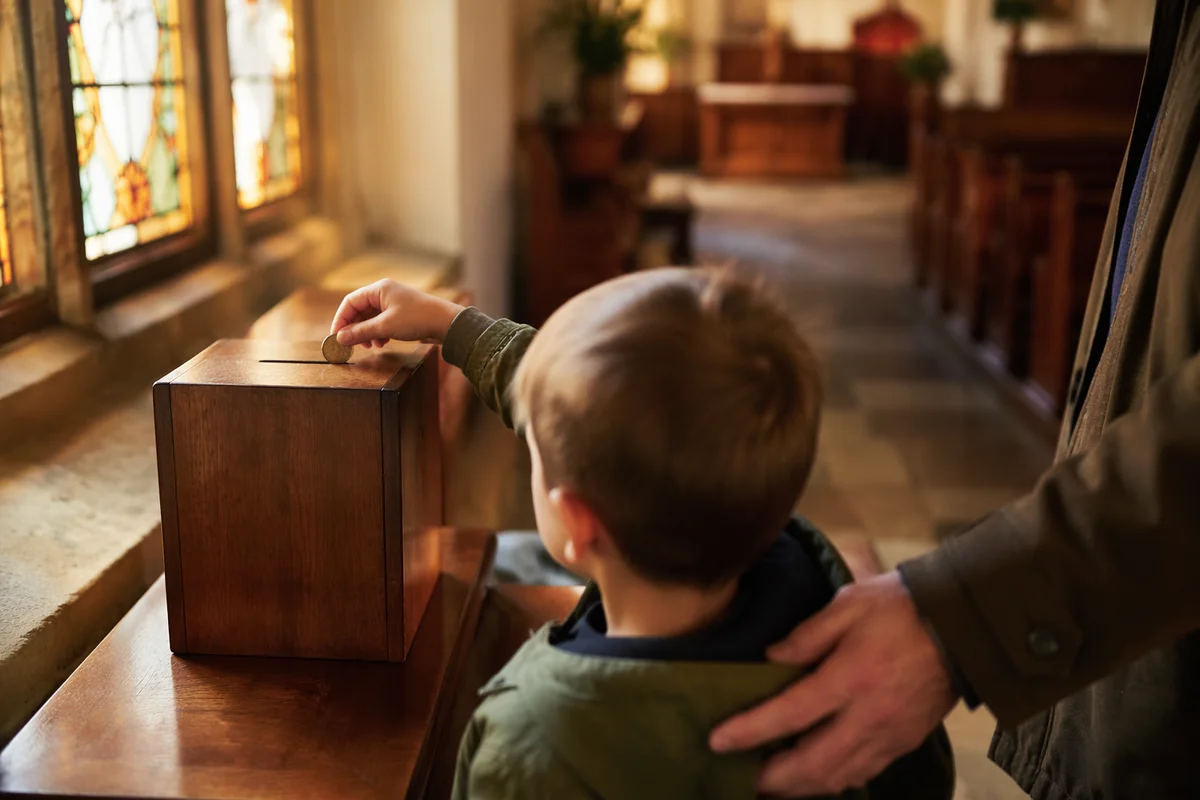 Child Giving Coin in Church Vestibule
