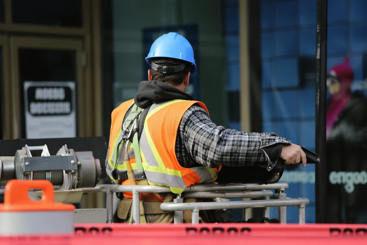 Construction Worker on Urban Building Site