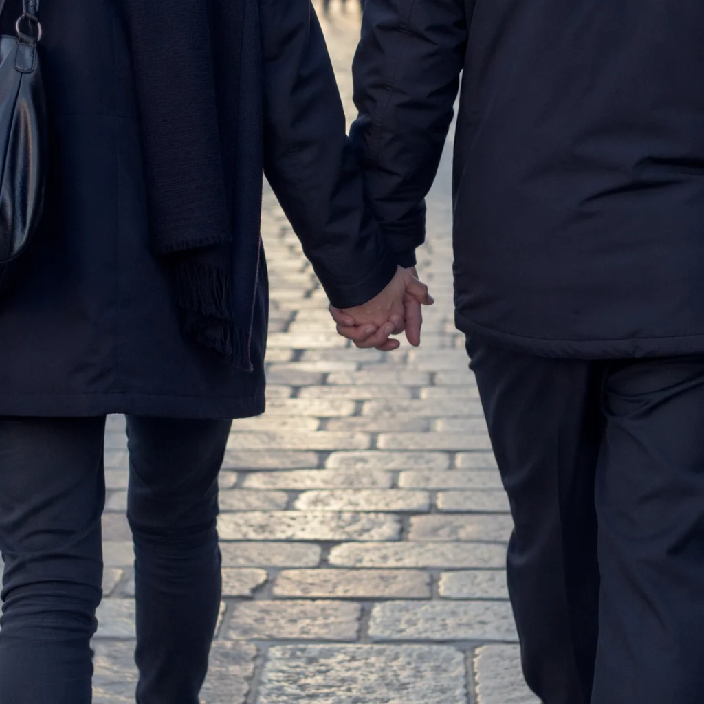 Romantic Couple Walking Hand in Hand