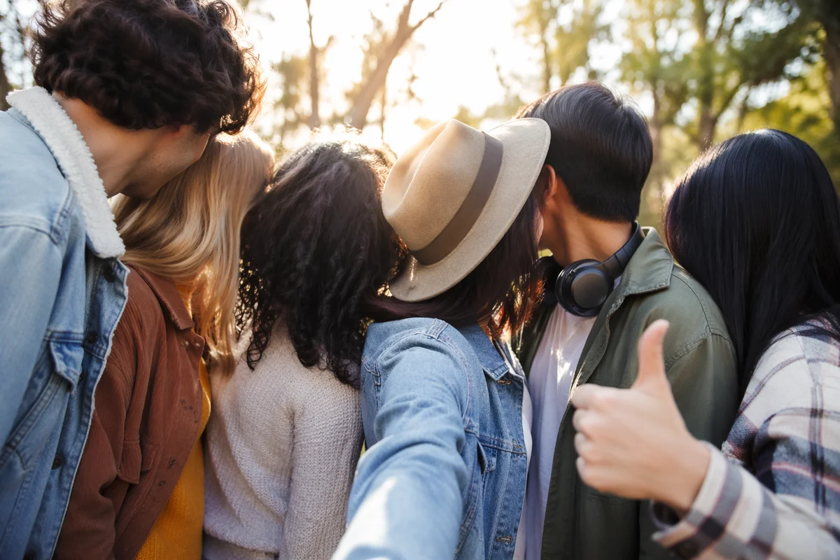 Diverse Friends Smiling in Sunny Park