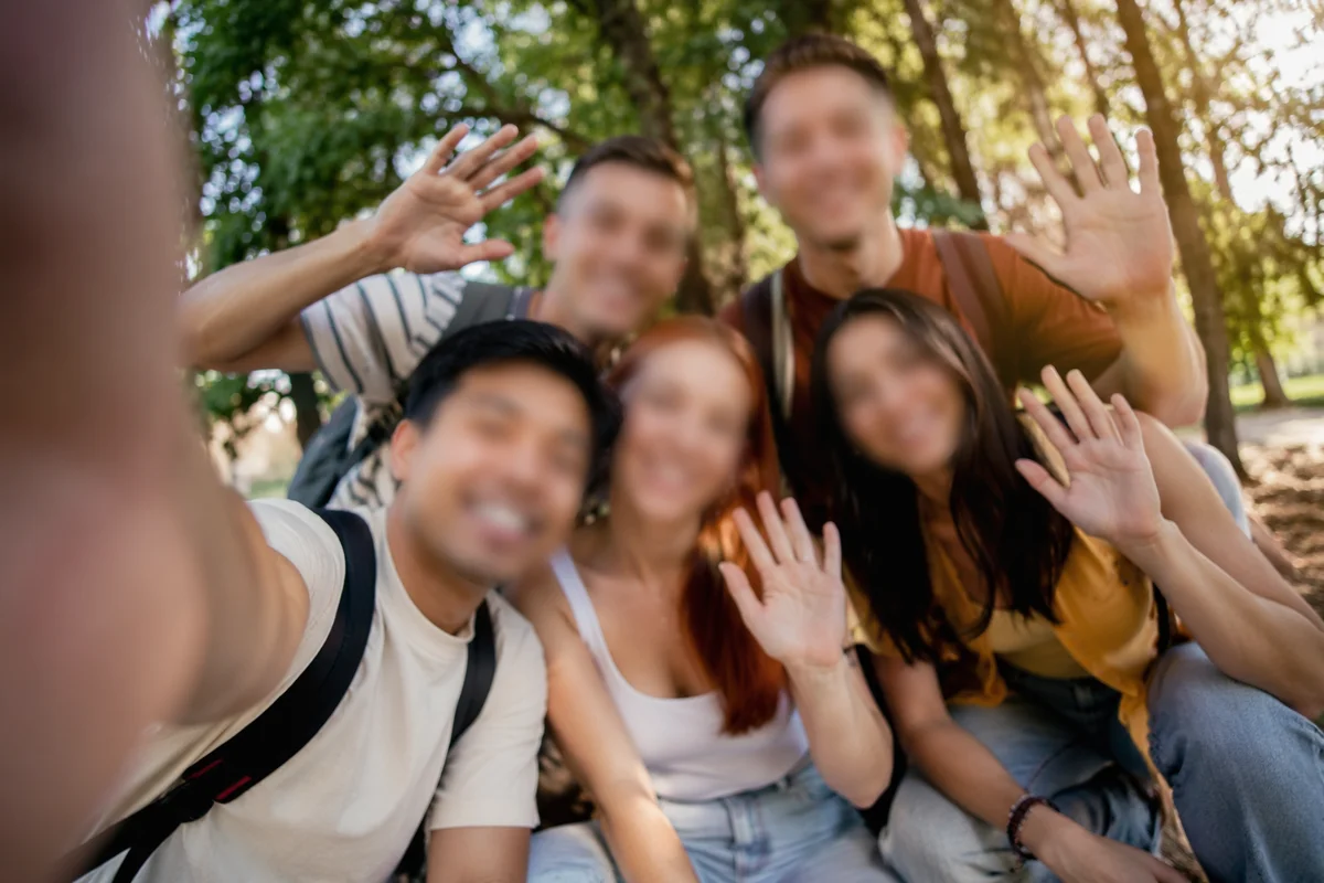 Diverse Friends Smiling in Sunny Park
