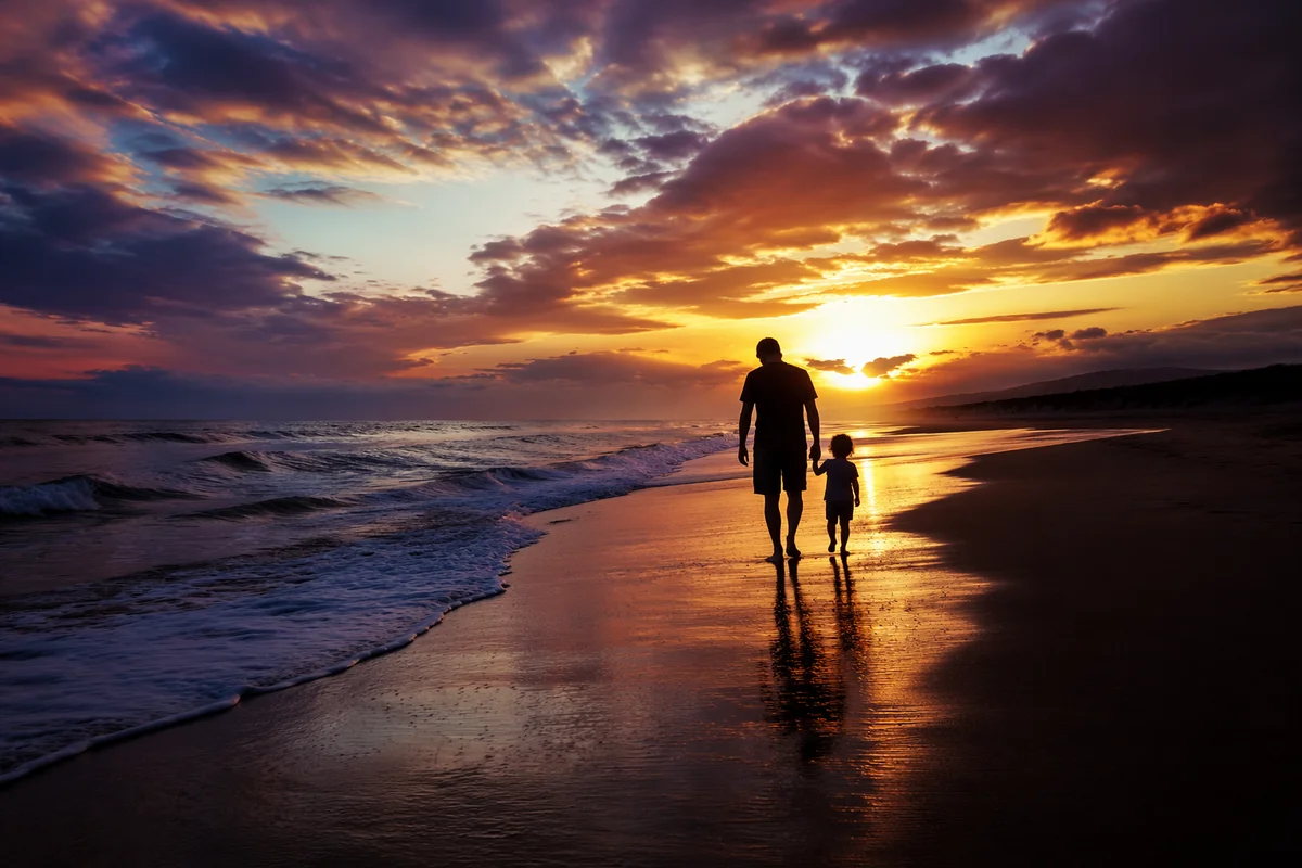 Family Silhouettes Walking on Beach at Sunset